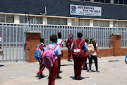 Learners from Hoerskool Jan Viljoen in Randfontein leave school as parents protest outside the school because of allegations of racism after a grade 12 learner was allegedly assaulted on Friday. 