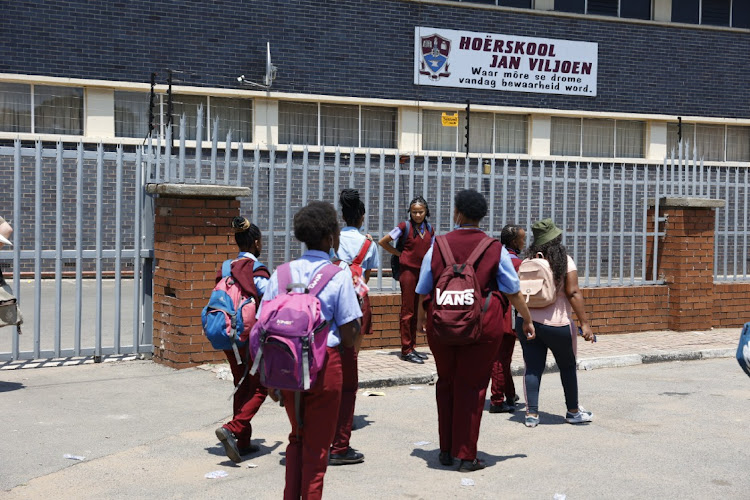 Learners from Hoerskool Jan Viljoen in Randfontein leave school as parents protest outside the school because of allegations of racism after a grade 12 learner was allegedly assaulted on Friday.