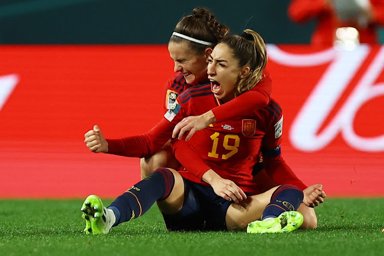 Spain's Olga Carmona celebrates scoring their second goal with teammate Teresa Abelleira in their Women’s World Cup semifinal against Sweden at Eden Park in Auckland, New Zealand on August 15 2023.