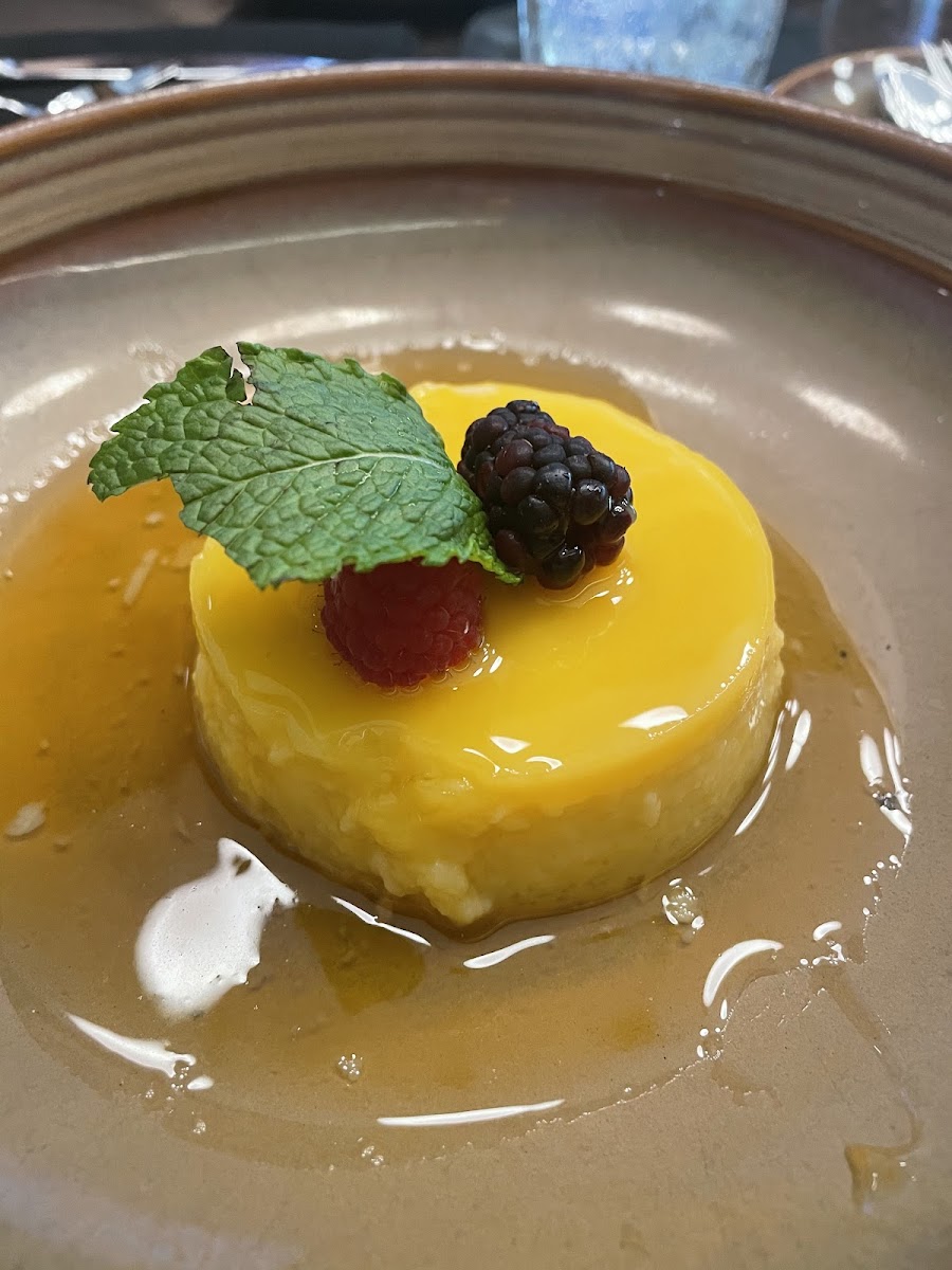 FLAN Passion fruit flan finished with raspberries.