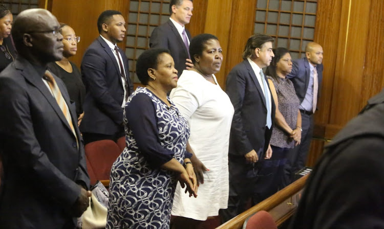 The accused in the Nulane Investments R24.9m fraud and money-laundering case are, from left, Peter Thabethe, Limakatso Moorosi, Seipati Dhlamini, Iqbal Sharma, Ronica Ragavan and Dinesh Patel.