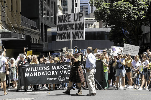 Anti-vaxxers take to the streets in Sydney, Australia, in February.