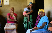 Family members mourn the death of Madan Motlhamme who was stabbed to death by another pupil at Mateane Primary School near Delareyville on Tuesday. / Tiro Ramatlhatse