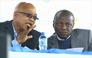 President Jacob Zuma and Minister in the Presidency Collins Chabane during a visit to Eldorado Park on May 14, 2013 in Johannesburg, South Africa.