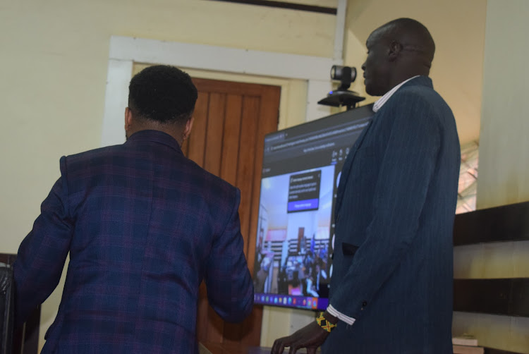 Lawyer Mugambi Sande cross examines the accused Patrick Naweet on April 29, 2024