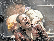 WET AND WILD: Anil Kapoor, back, in Shootout at Wadala, which is a thrilling gangster flick