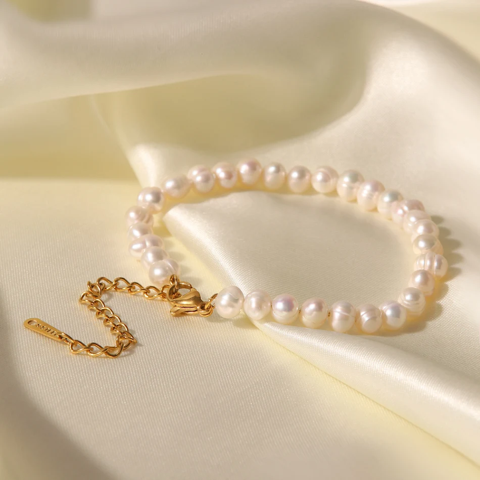 Pulseira de pérolas barrocas feminina Joia sofisticada e atemporal. Adicione elegância ao seu visual com pérolas naturais e design exclusivo. Perfeita para você.