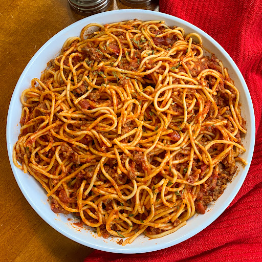 This tasty Instant Pot Spaghetti combines Italian Sausage, onions, garlic, a few herbs and spices, spaghetti noodles, and marinara sauce into a one pot delicious meal that is ready in less than twenty minutes. 