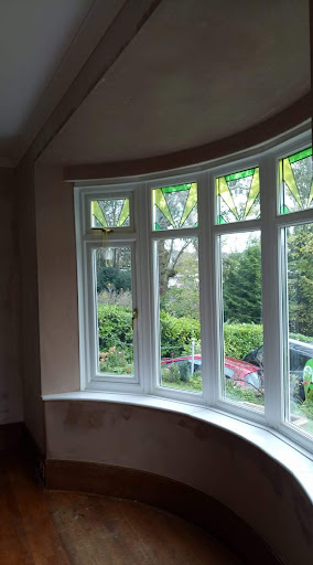 Lath & Plaster removed from window wall and new plaster applied.