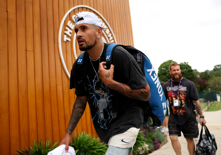 Nick Kyrgios of Australia makes his way back to the clubhouse after a practice session ahead of The Championships - Wimbledon 2023 at All England Lawn Tennis and Croquet Club on June 28 2023. Kyrgios has withdrawn from the tournament with a wrist injury.