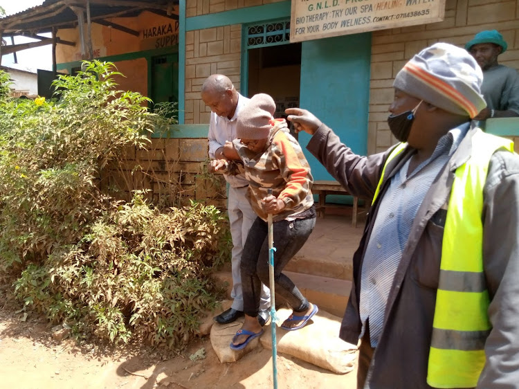 Musyoka Peter and a snakebite patient