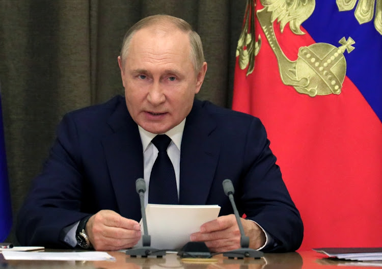Russian President Vladimir Putin chairs a meeting with the country's senior military officials and top executives of defence industry enterprises in Sochi, Russia, November 1 2021. Picture: SPUTNIK/EVGENIY PAULIN/KREMLIN