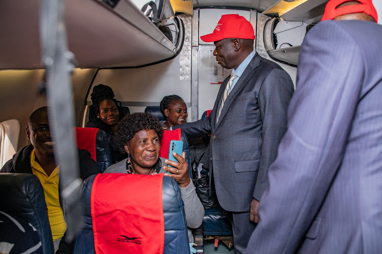 DP Rigathi Gachagua meets passangers during the launch of the first commercial flight from Wilson Airport to Kakamega town on December 14