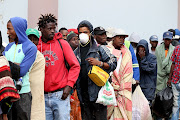 Homeless people in Durban queueing for medical tests