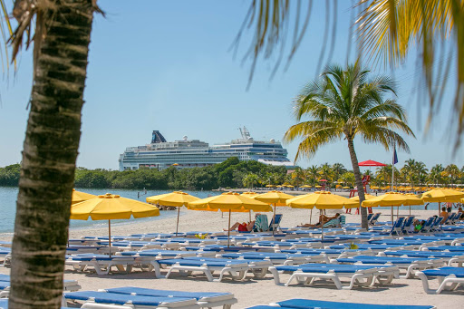 Norwegian Jade seen in the distance at the 75-acre oasis Harvest Caye in Belize. 