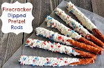 Patriotic Firecracker Dipped Pretzel Rods was pinched from <a href="http://livelovetexas.com/4th-of-july-dessert-patriotic-dipped-pretzel-rods/" target="_blank">livelovetexas.com.</a>