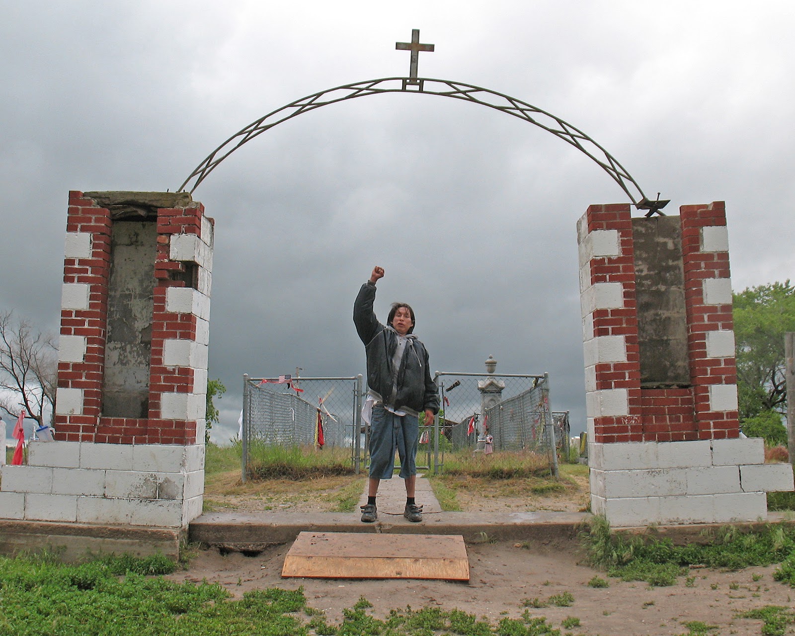 File:Wounded Knee Cemetery with Daniel.jpg - Wikimedia Commons