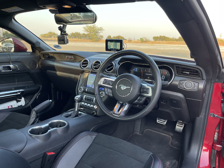 The Mustang wired up to the VBOX telemetry system to enable precision performance testing.