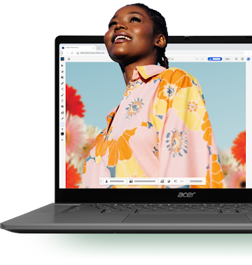 A photo of a woman in a pink, floral shirt is being edited in Photoshop on a Chromebook.