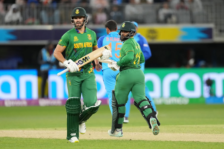 Temba Bavuma and Aiden Markram of the Proteas take a single during the 2022 ICC T20 World Cup match against India at Optus Stadium in Perth on October 30 2022.