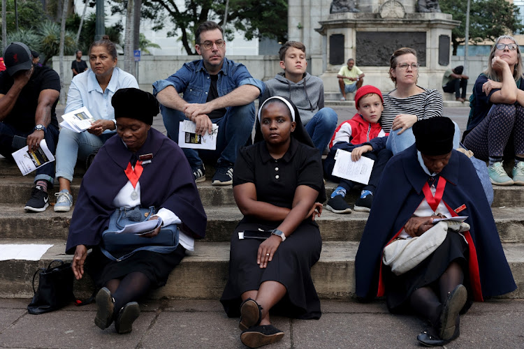 Young and old gathered for the annual Easter service at the City Hall in Durban which was followed by a silent Good Friday procession.