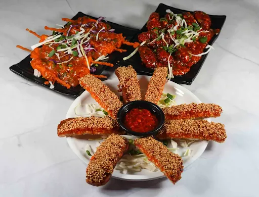 Gold Finger With Spicy Schezwan Bullets And Paneer Satay
