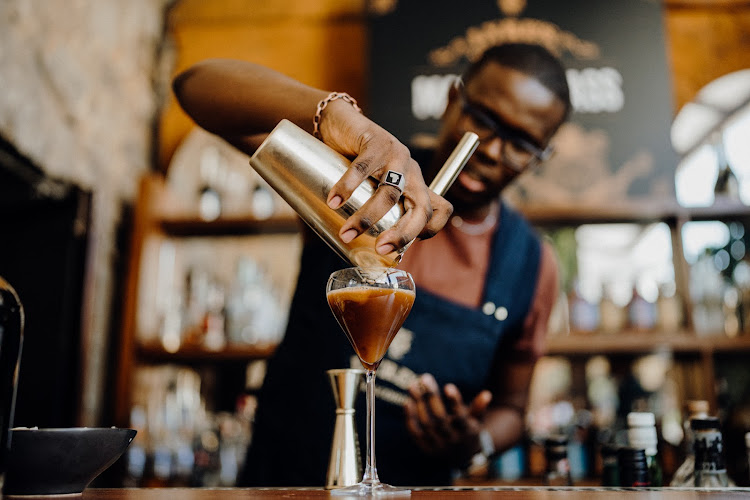 Pouring a Lyre’s espresso martini.