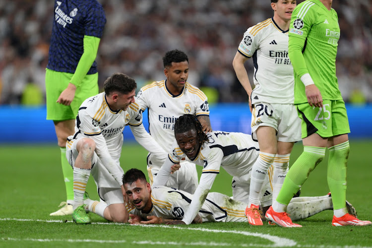 Federico Valverde, Joselu, Rodrygo and Eduardo Camavinga of Real Madrid celebrate after the team's victory in the Uefa Champions League semifinal second leg against FC Bayern Münich at Estadio Santiago Bernabeu in Madrid on Wednesday night.