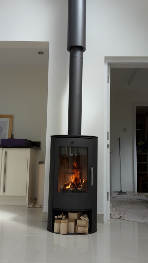 Fireplace Monte Carlo 5Kw woodburner. Installed in open plan kitchen area.