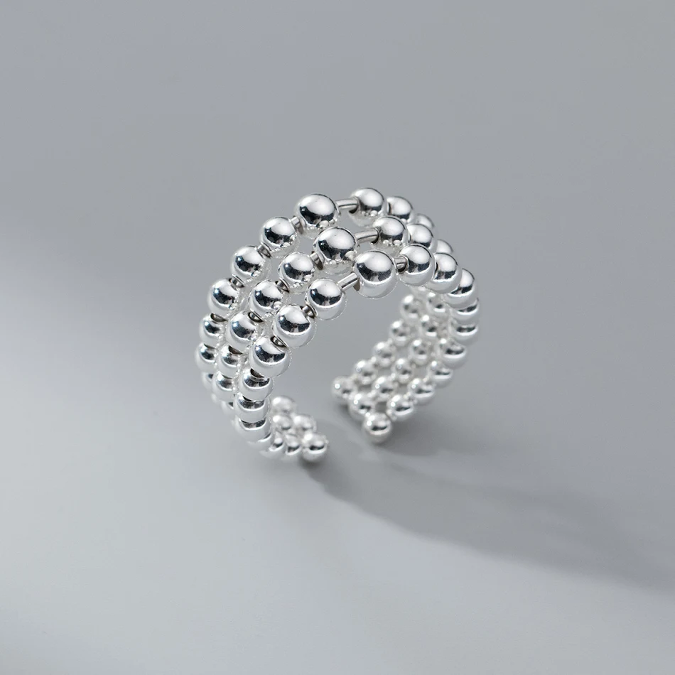 Pulseira com anel de contas redondas de três camadas vazadas, elegante e charmosa. Adicione um toque de sofisticação ao seu visual diário e eventos.