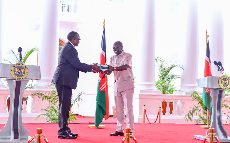 President William Ruto receives Police reforms report from Former CJ David Maraga at State House, Nairobi on November 16, 2023