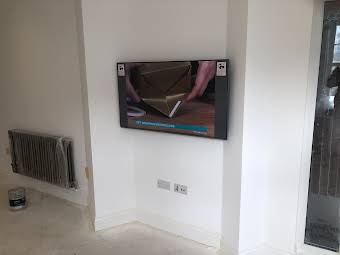 TV install on recess wall  album cover