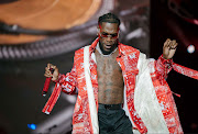 Burna Boy performs at the DStv Delicious International Food and Music Festival. 