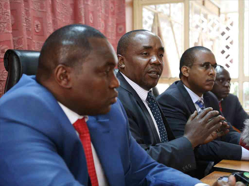 Maara MP Kareke Mbiuki,Kiambu MP Jude Njomo and Mbala Mbala Abdikadir Aden during a media briefing in Parliament where they commented on the Banking (Amendment) Bill that proposes to put a cap on the rate of interest charged on loans and to fix the minimum rate of interest.Photo/HEZRON NJOROGE