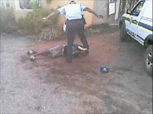 LAWLESS: Cellphone video footage shows a pupil being beaten up by a top policeman in Limpopo on November 24 last year.