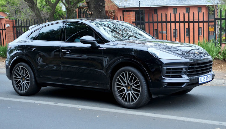 A 2019 black Porsche Cayenne S Coupe valued at just under R2m.