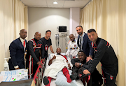 TS Galaxy members with Bernard Parker in hospital. The veteran striker was admitted with a broken leg.