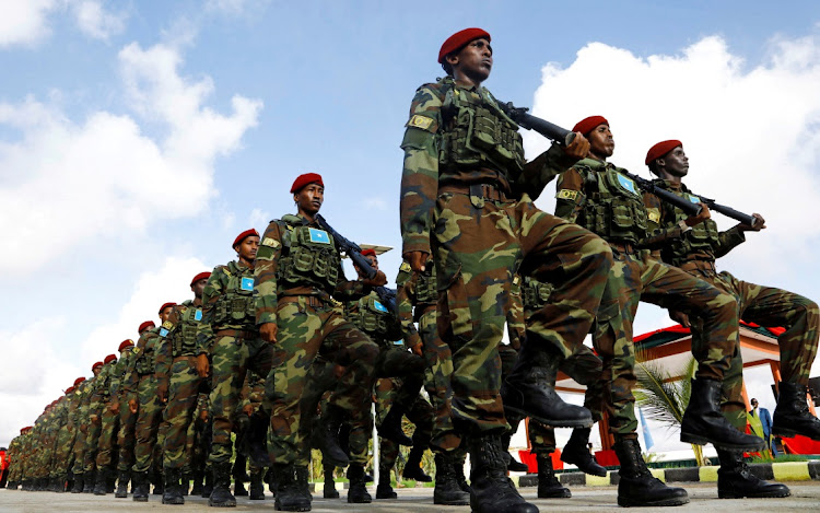 Somali military officers march in a parade during celebrations to mark the 62nd anniversary of the Somali National Armed Forces in Mogadishu, Somalia April 12, 2022.