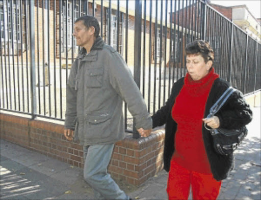 OFF THE HOOK: Susanna Harmse with her husband Abraham outside the Germiston Magistrate's Court yesterday. Murder charges against Harmse were withdrawn. PHOTO: SIBUSISO MSIBI