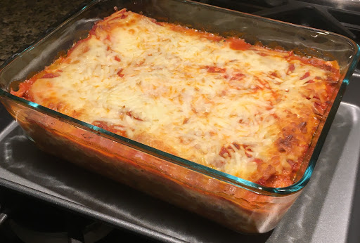 Just baked pan of lasagne, ready to cut.