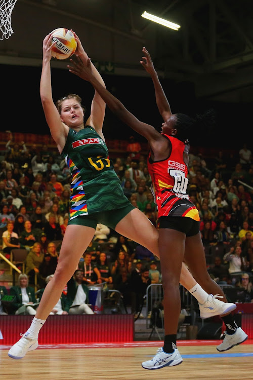 Elmerè van der Berg of SA and Faridah Kadondi of Uganda in action during the Netball World Cup in the Cape Town International Convention Centre on Sunday. SA were edged out 49-47 to finish in sixth place. Picture: SHAUN ROY/GALLO IMAGES