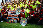 Race winner Charles Leclerc celebrates with the rest of the Ferrari team after the F1 Grand Prix of Australia at Melbourne Grand Prix Circuit on April 10, 2022 in Melbourne, Australia.