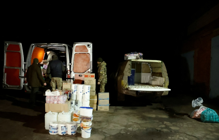 In Sloviansk Ukrainian Border Guards receive donations of food and gifts from their families and people in general on December 29 as Russia's attack on Ukraine continues. Russia's actions have triggered sanctions which are forcing it to divert its crude and refined fuel products to Asia from Europe. Picture: REUTERS/CLODAGH KILCOYNE