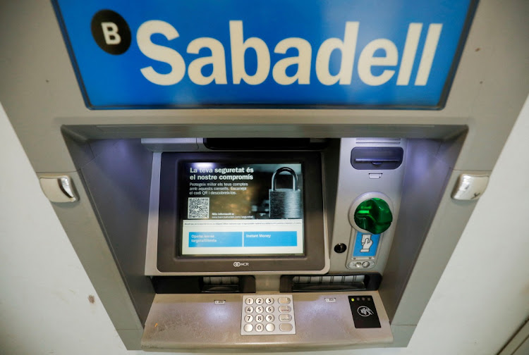 A Sabadell bank ATM outside an office in Barcelona, Spain, September 7 2021. Picture: REUTERS/ALBERT GEA