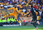 Khama Billiat of Kaizer Chiefs challenged by Happy Jele of Orlando Pirates during the Absa Premiership 2018/19 match between Orlando Pirates and Kaizer Chiefs at FNB Stadium, Johannesburg on 27 October 2018.