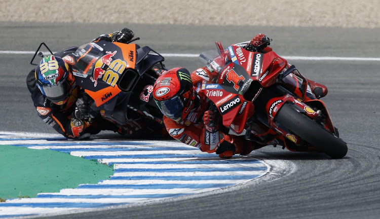 Ducati Lenovo Team's Francesco Bagnaia and Red Bull KTM Factory Racing's Brad Binder in action at the Spanish MotoGP at Circuito de Jerez in Spain, April 30 2023. Picture: JON NAZCA/REUTERS