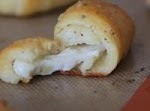 Cheesy-Stuffed Garlic Butter Crescents was pinched from <a href="http://www.laurenslatest.com/cheesy-stuffed-garlic-butter-crescents/?utm_source=feedburner" target="_blank">www.laurenslatest.com.</a>