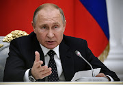 Russia's President Vladimir Putin attends a meeting with representatives of the Russian business community at the Kremlin in Moscow, Russia, on December 26 2018. In a New Year letter to his US counterpart Donald Trump, Putin said on Sunday that Moscow was ready for dialogue on a 