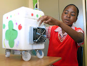 Tumelo  Ramokone of  Mapudithomo Primary  at Nobody village, Limpopo,   used the internet to research  her  solar cooler box. / ANTONIO MUCHAVE