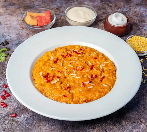 Ghee Loaded Dal Khichdi ( With Fruits N Curd)